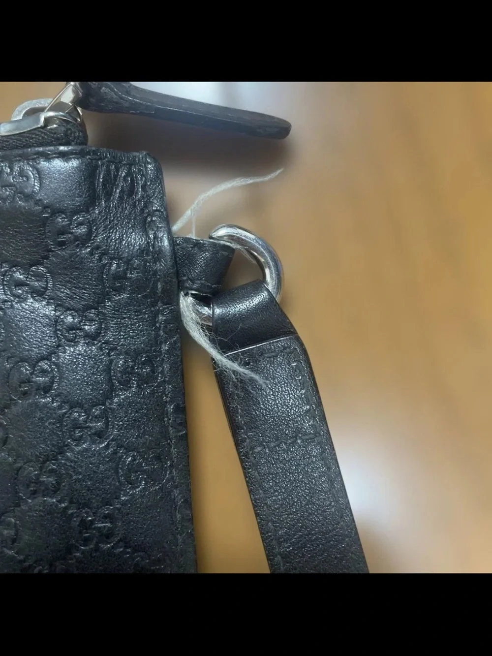 Gucci Black Embossed Leather Wristlet Clutch